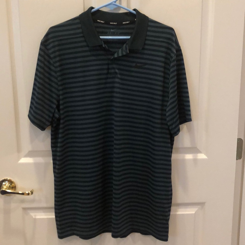 Nike golf shirt.